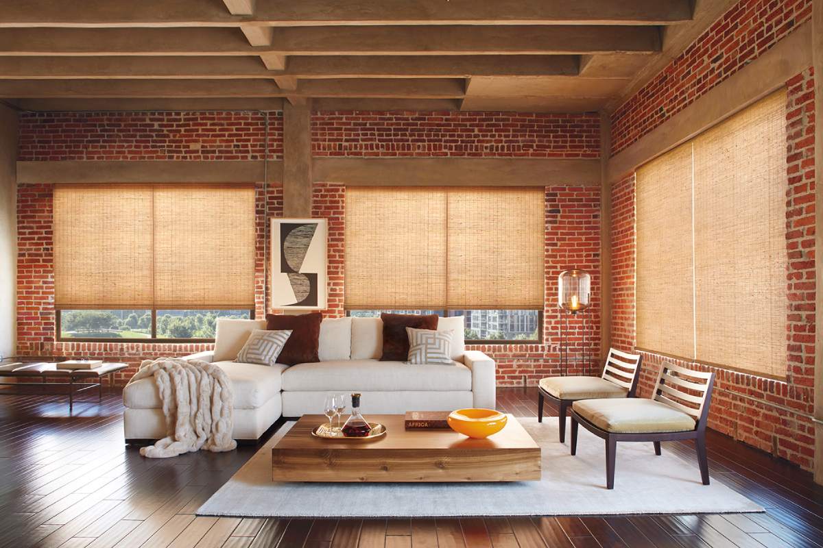 Hunter Douglas Provenance® Woven Wood Shades hanging on a living room window near Helena, Montana (MT)